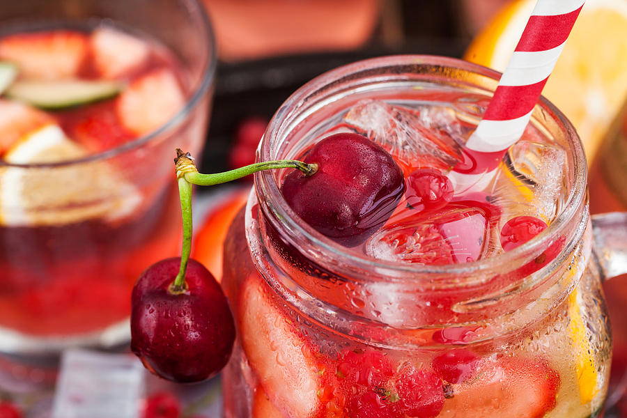 Healthy infused detox water with fresh berries and fruits in mason jar Photograph by Ekaterina Smirnova