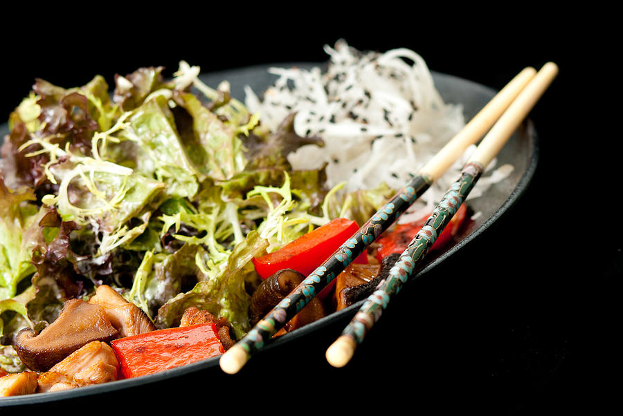 Healthy Japanese salad on the black plate Photograph by Nik0s