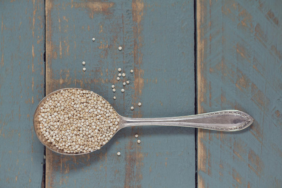 Healthy quinoa seed or grain on a spoon Photograph by Miss Pearl