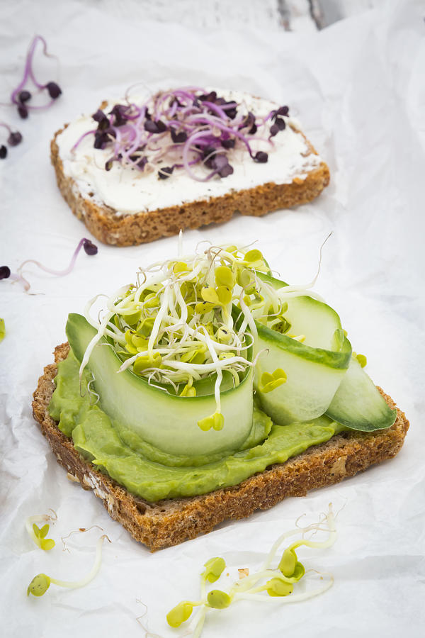 Healthy whole grain bread with different toppings Photograph by Larissa Veronesi