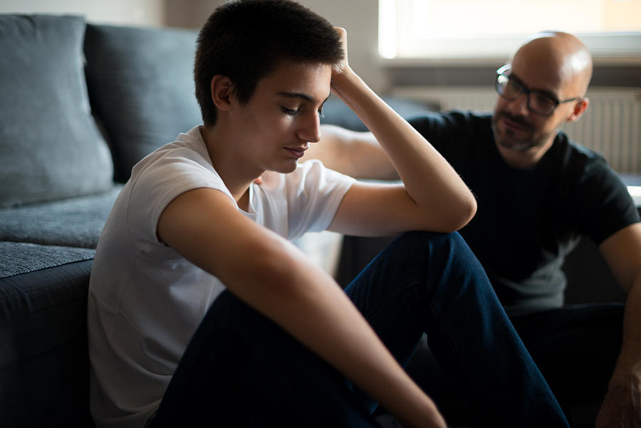 Hearing a fathers advice Photograph by Georgijevic