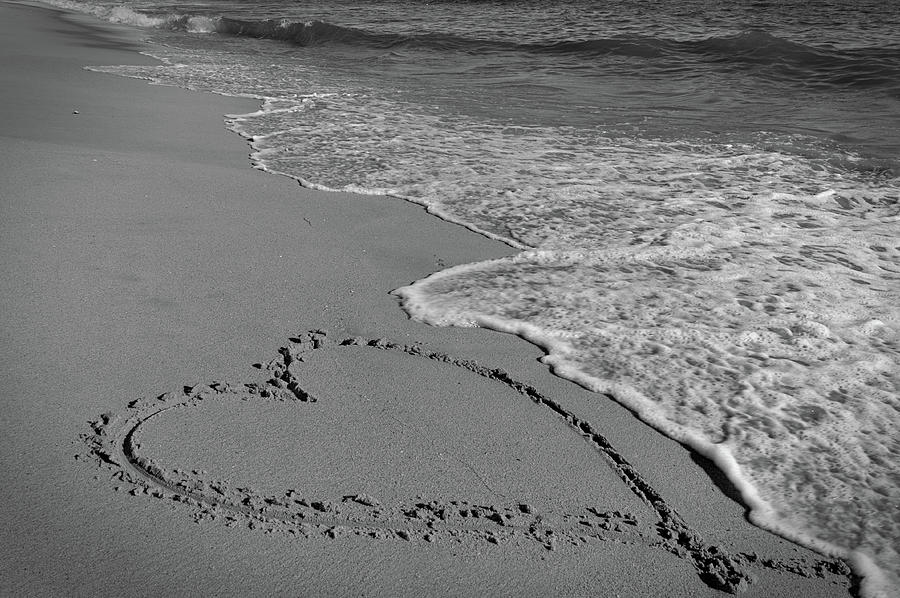 Heart and beach waves in monochrome Photograph by Angelo DeVal