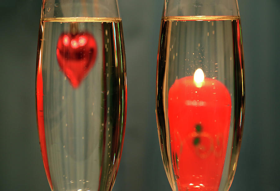 Heart And Candle In Glasses With Champagne Photograph by Mikhail Kokhanchikov
