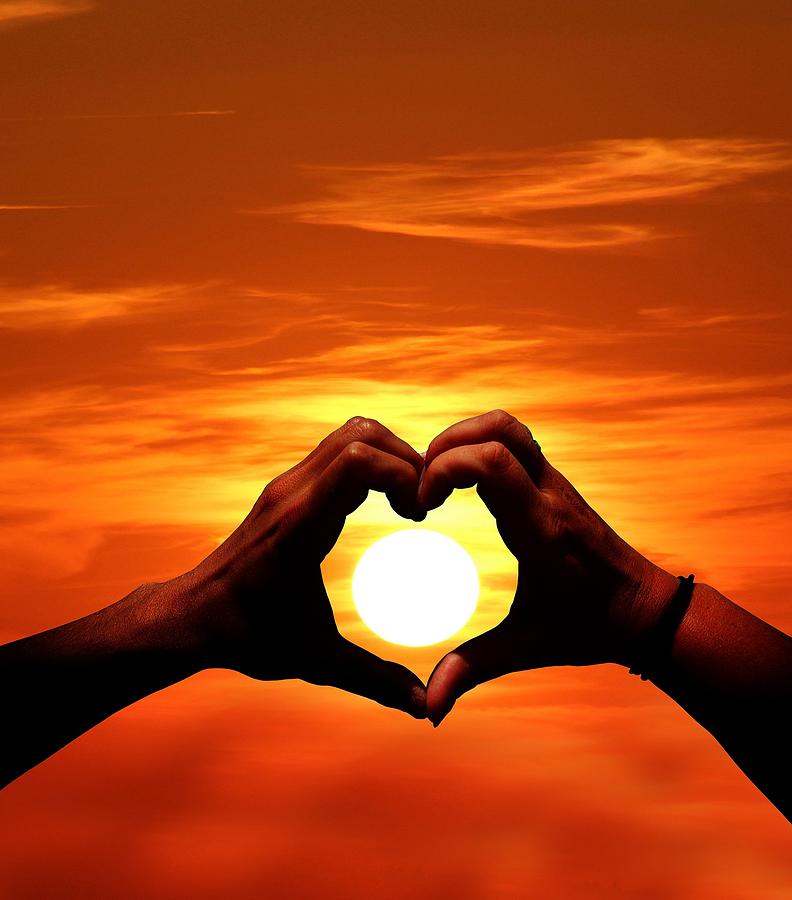 Heart and Hands at Sunset Photograph by Nancy Ayanna Wyatt