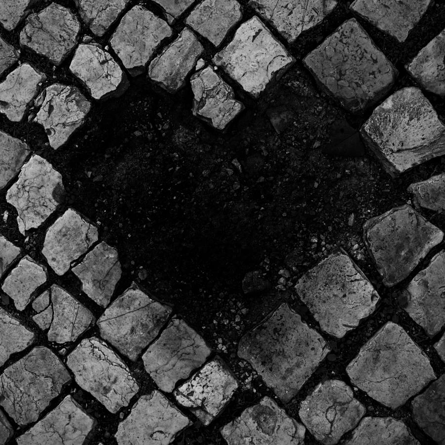 Heart shape on pavement Photograph by Andre Castilho / FOAP
