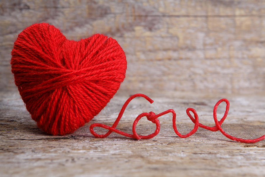 Heart-shaped ball of yarn, with words of love thread Photograph by Nambitomo