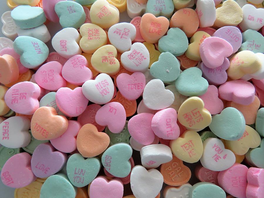 Heart-shaped conversation candies, background, copy space Photograph by Christine_Kohler
