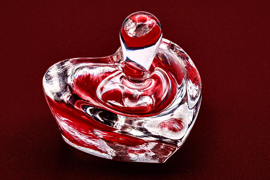 Heart Shaped Glass Perfume Bottle - Red Photograph by Stuart Litoff