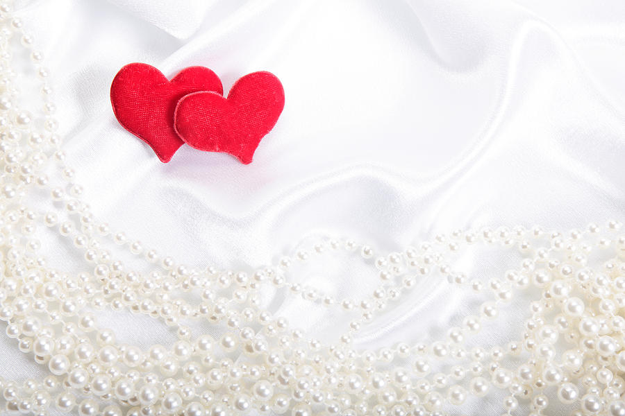 Hearts on pearls background Photograph by Fotek