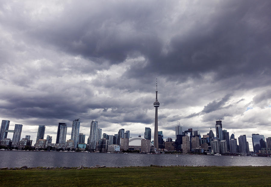 Heavy clouds above Toronto skyline Photograph by Henryk Sadura