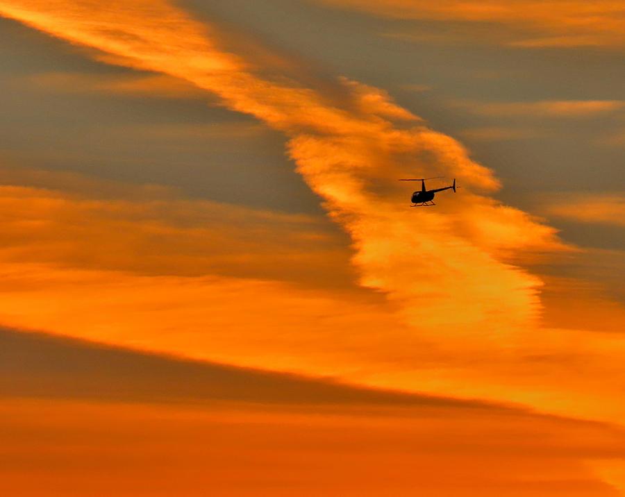 Helicopter Approaching at Sunset Photograph by Linda Stern