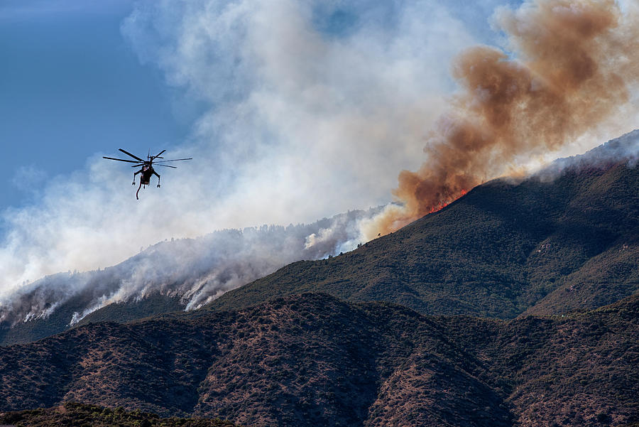 Helicopter flying into action on the Telegraph Forest Fire near Globe AZ Photograph by Dave Dilli