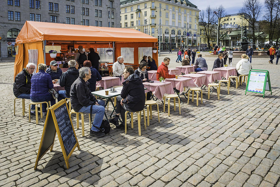 Helsinki people at outdoor cafe stall in Market Square Finland Photograph by fotoVoyager