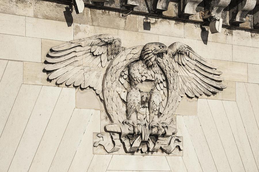 Heraldic animal eagle with a laurel wreath, relief on bridge, Pont Neuf, Paris, France Photograph by Gunter Lenz