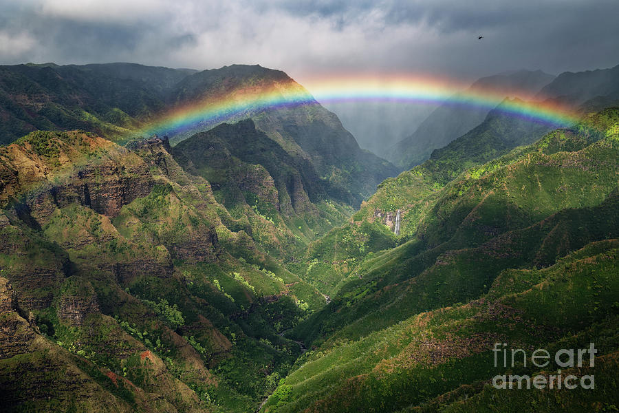 Nature Photograph - Hidden Waterfall in a Lush Green Canyon with Rainbow on Kauai by Tom Schwabel