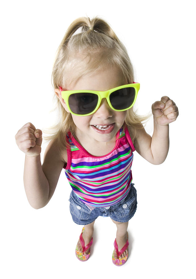 High Angle Full Length Shot Of A Female Child In Sunglasses As She Looks Up At The Camera Photograph by Photodisc