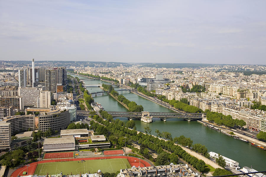 High angle view of a river passing through a city, Seine River, Paris, France Photograph by Glowimages