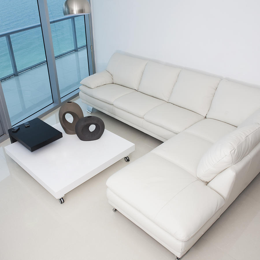 High angle view of sofa and coffee table in modern living room Photograph by Camilo Morales