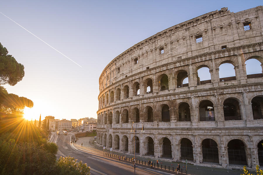 High angle view over the Colosseum at sunrise. Rome, Lazio, Italy. Photograph by © Marco Bottigelli