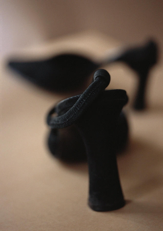 High-heeled shoes, close-up, blurred Photograph by Michele Constantini