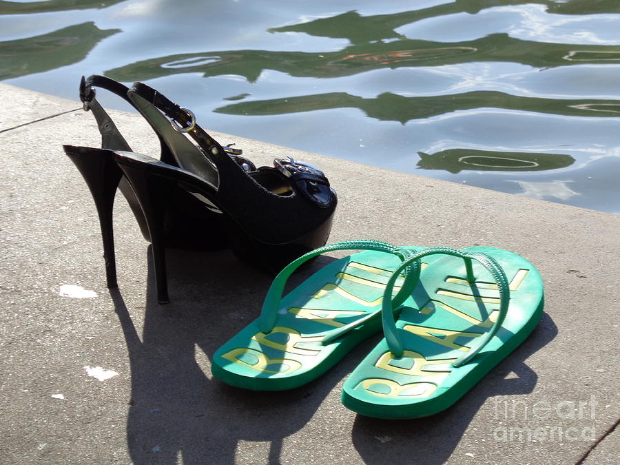 High Heels vs. Bathing Slippers Photograph by Thomas Schroeder