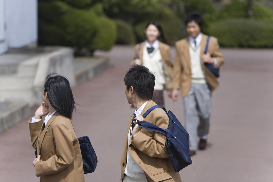 High School Students Walking Outside Together, Selective Focus Photograph by Daj