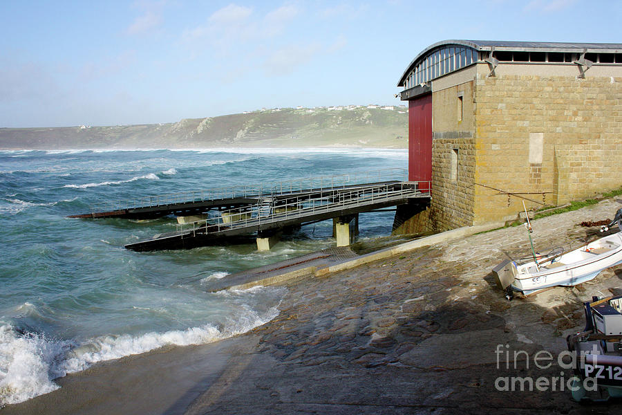 High Tide at Sennen Cove Lifeboat Station Photograph by Terri Waters