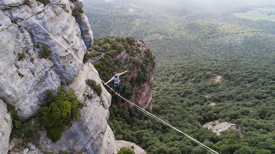 Highlining in the mountains Photograph by Aluxum
