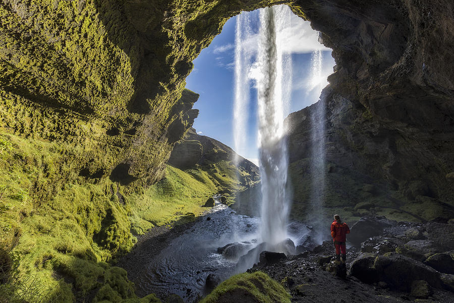 Hiker at Majestic Kvernufoss Waterfall in Iceland Photograph by DieterMeyrl