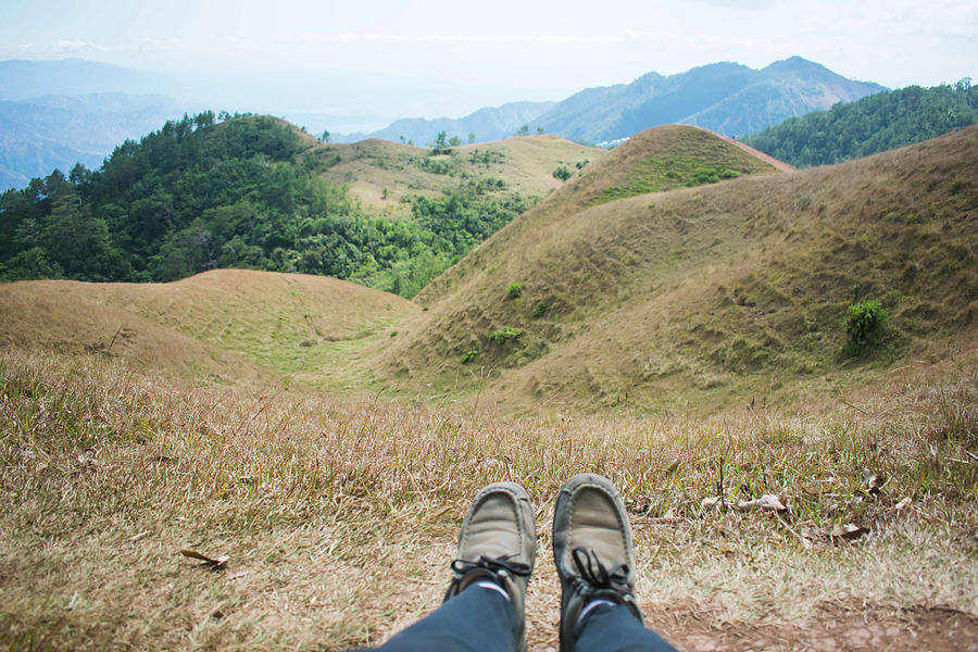 Hiker viewing the scenic mountain ranges of the Philippines Photograph ...