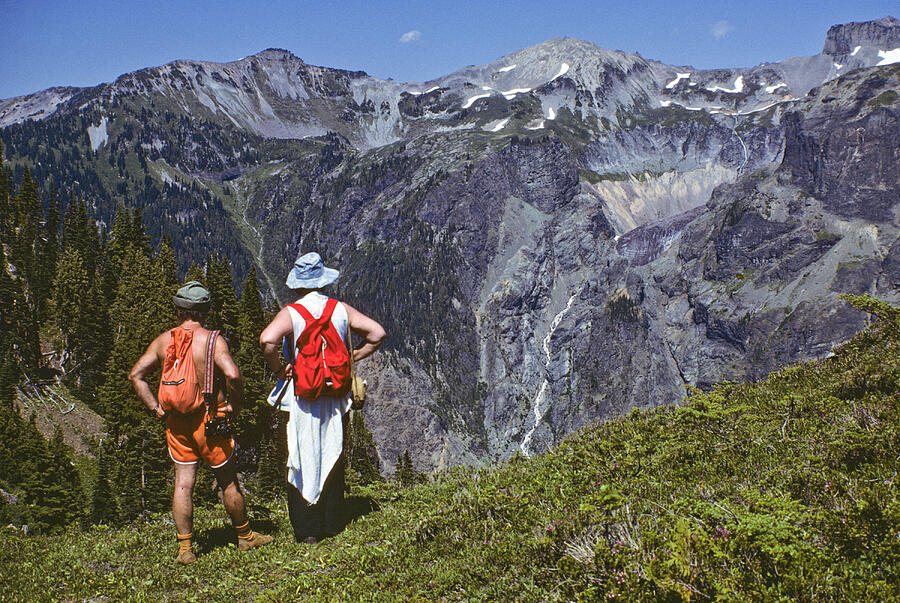 Hikers Enjoying the View Photograph by JeffGoulden