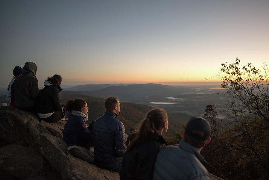 Hikers Watching A Sunrise At Humpback Rock Photograph by Doug Ash