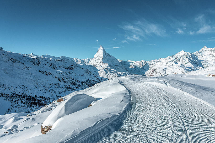 Hiking path in front of the Matterhorn in the morning light in w Photograph by Benoit Bruchez