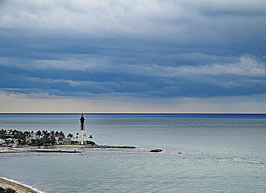 Hillsboro Inlet Lighthouse Under Clouds Photograph by Corinne Carroll