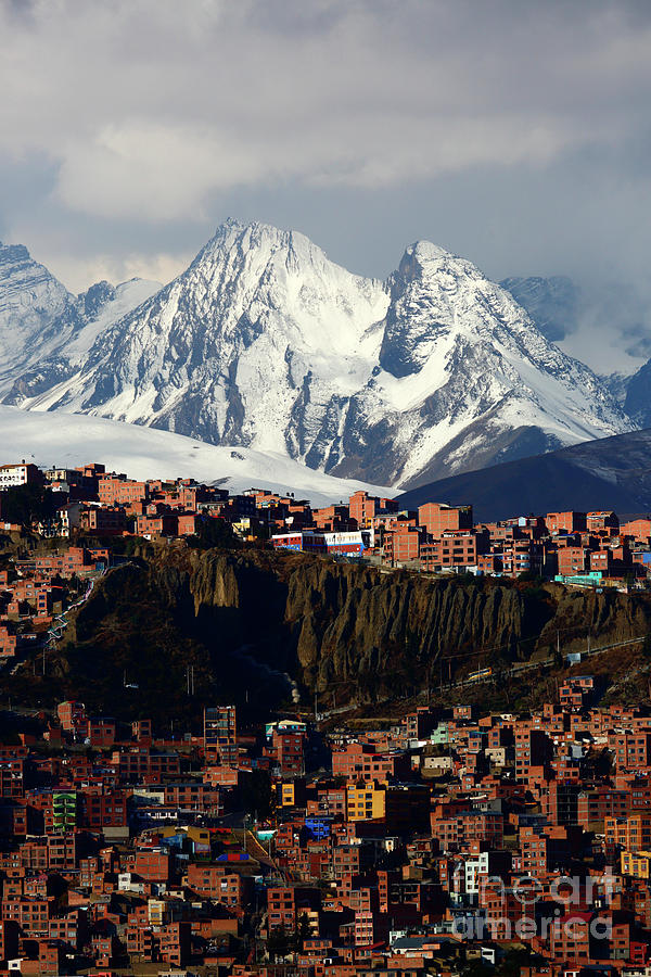 City Photograph - Hillside suburbs rise to meet The Andes La Paz Bolivia by James Brunker