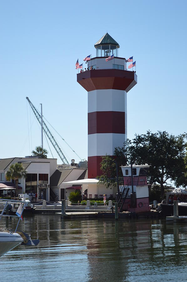 Hilton Head Island lighthouse at Harbor Town Photograph by Kathy Lyon ...