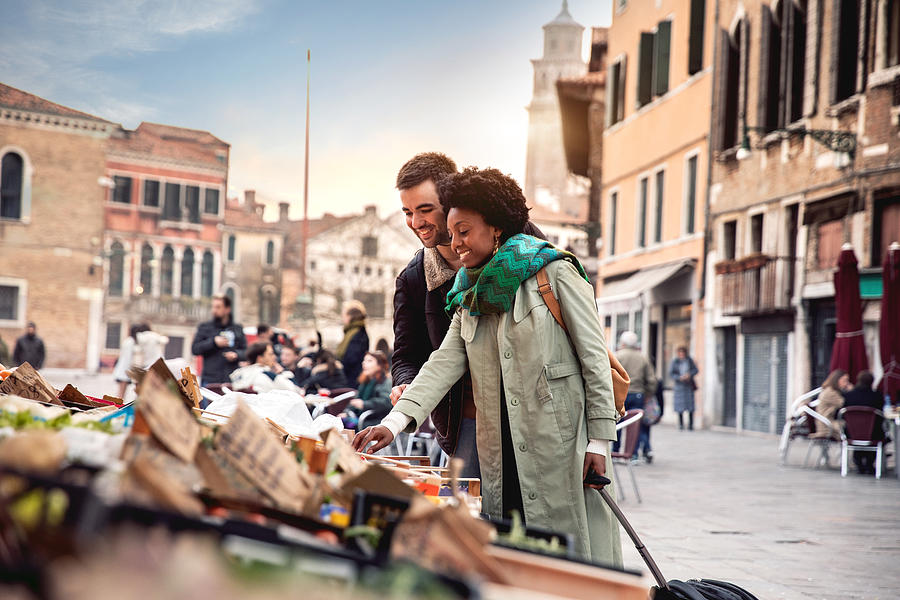 Hispanic brazilian couple enjoying an holiday vacation in Venice - Italy Photograph by LeoPatrizi