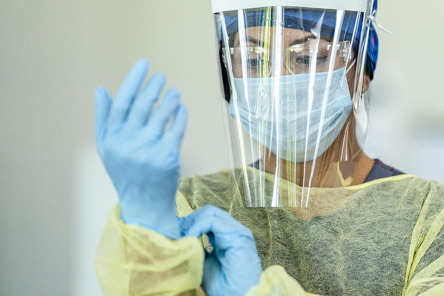 Hispanic female medical professional in Personal Protective Equipment Photograph by FatCamera