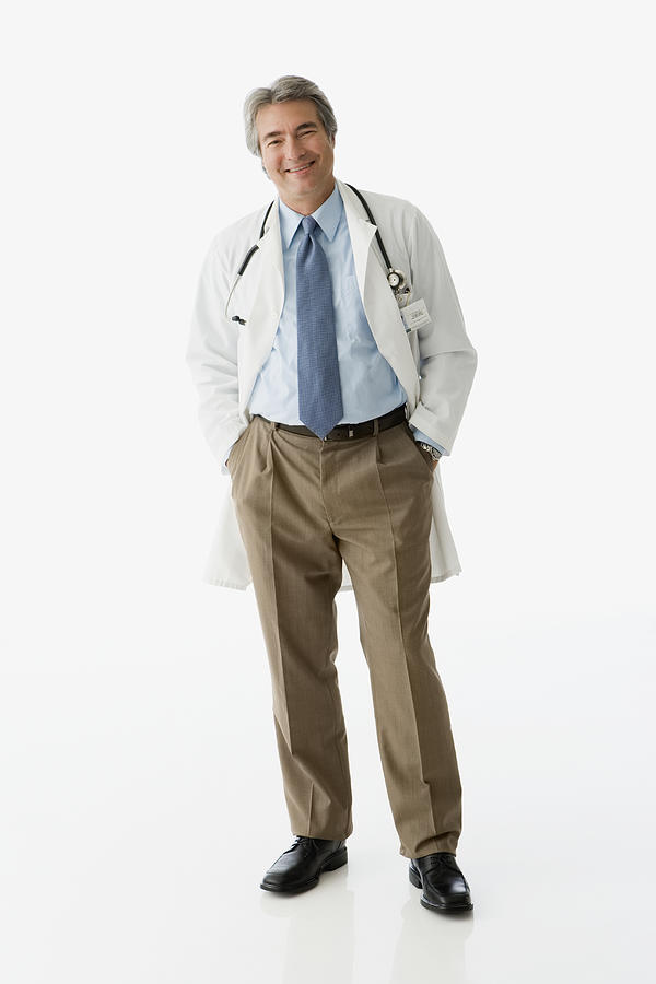 Hispanic male doctor with hands in pockets Photograph by Jose Luis Pelaez Inc