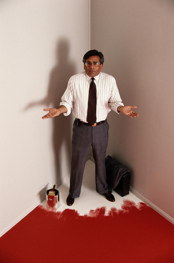 Hispanic Man Painting Himself Into A Corner Photograph by Larry Dale Gordon