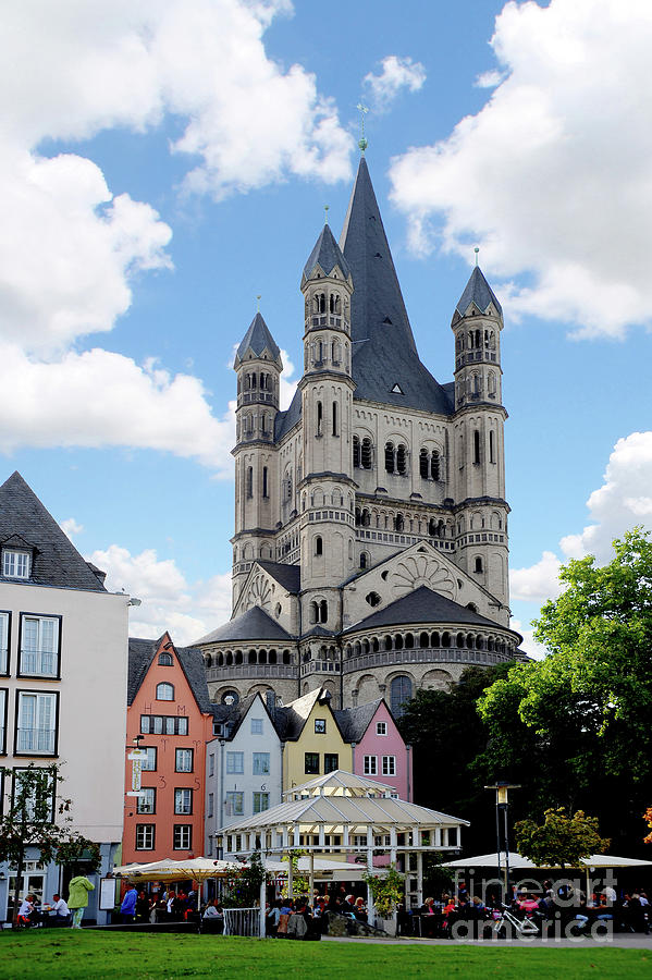 Historic colored houses of old town Cologne and Saint Martins Church.  Photograph by Gunther Allen
