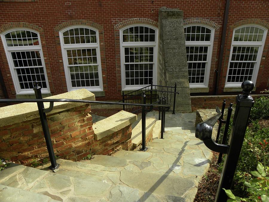 Historic Revolution Mill Courtyard Photograph by Sandi OReilly