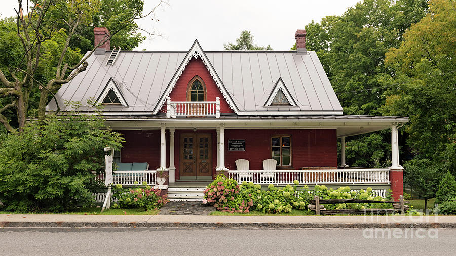 Historical house on Rue Laurier in Victoriaville, Quebec, Canada Photograph by Marek Poplawski