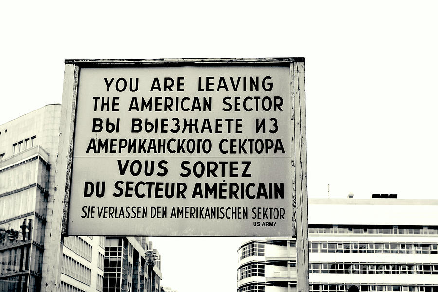 Berlin Photograph - Historical sign at Checkpoint Charlie in Berlin by Patricia Hofmeester