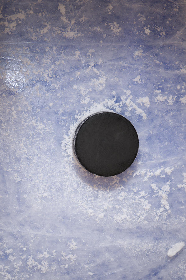Hockey Puck on the blue line Photograph by Dbrskinner