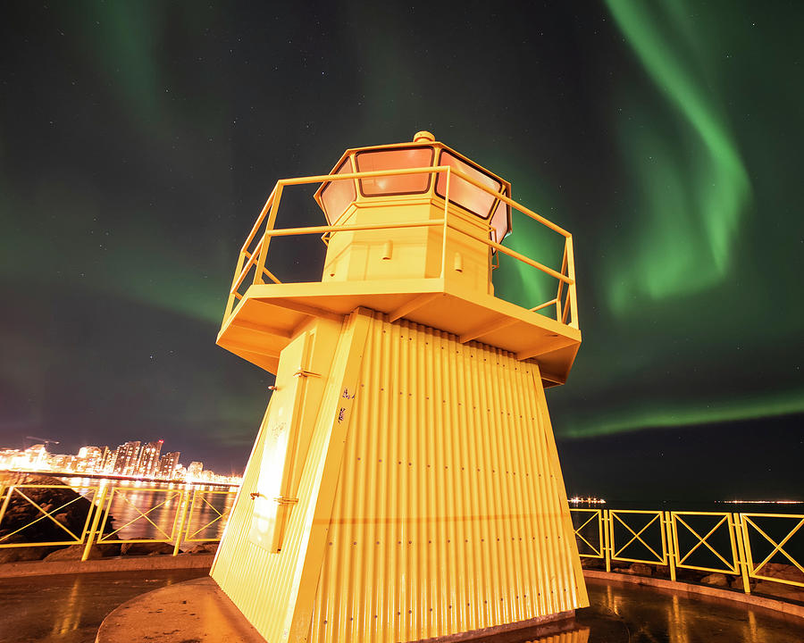 Hofoi lighthouse Northern Lights on the Reykjavik Waterfront Iceland Streak Photograph by Toby McGuire