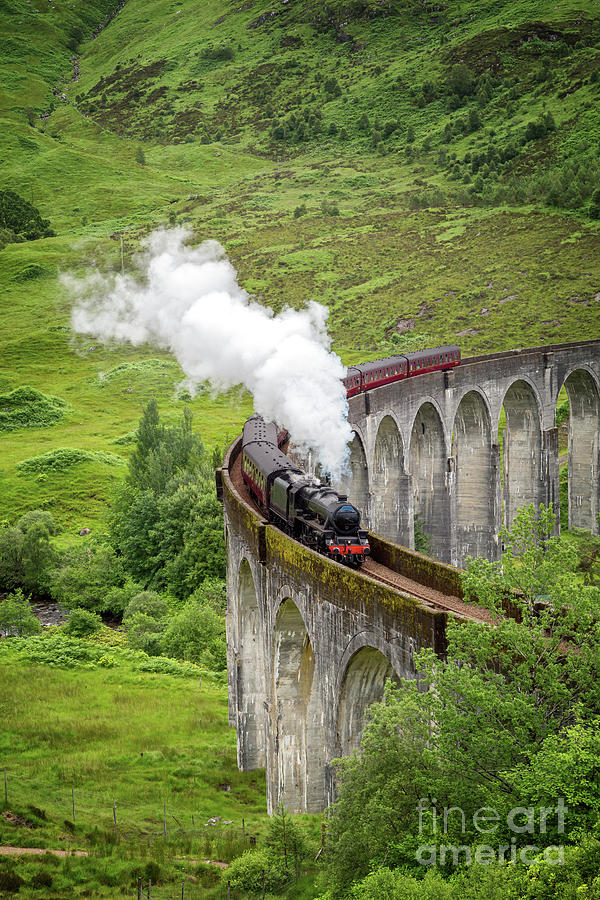 Hogwarts Express.A vintage steam train crosses the Glenfinnan Viaduct, Scottish H Photograph by Jane Rix
