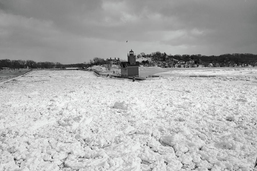 Holland Michigan Lighthouse in the winter in black and white Photograph by Eldon McGraw