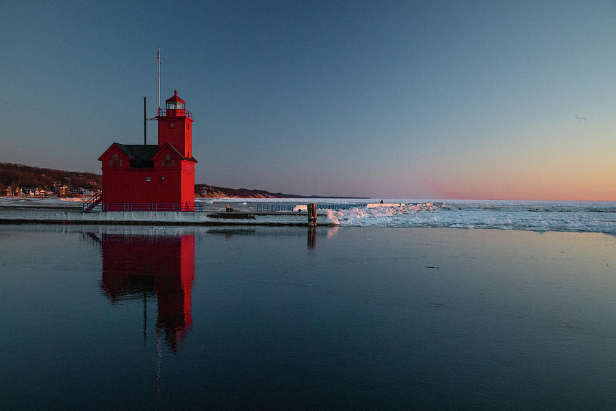 Holland Michigan Lighthouse reflections on channel water Photograph by Eldon McGraw
