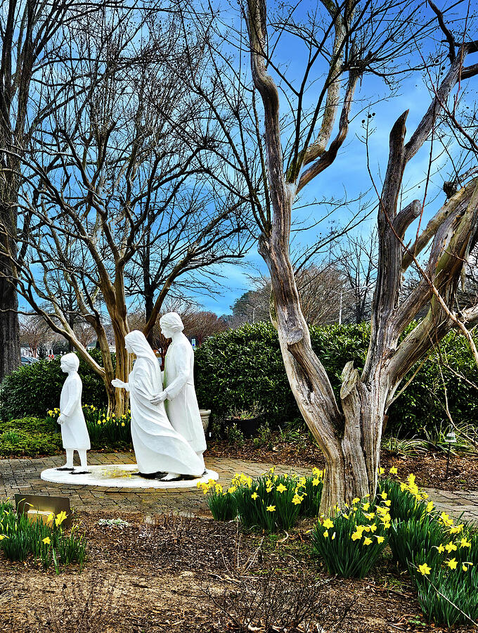 Holy Family Sculpture With The Daffodils Photograph